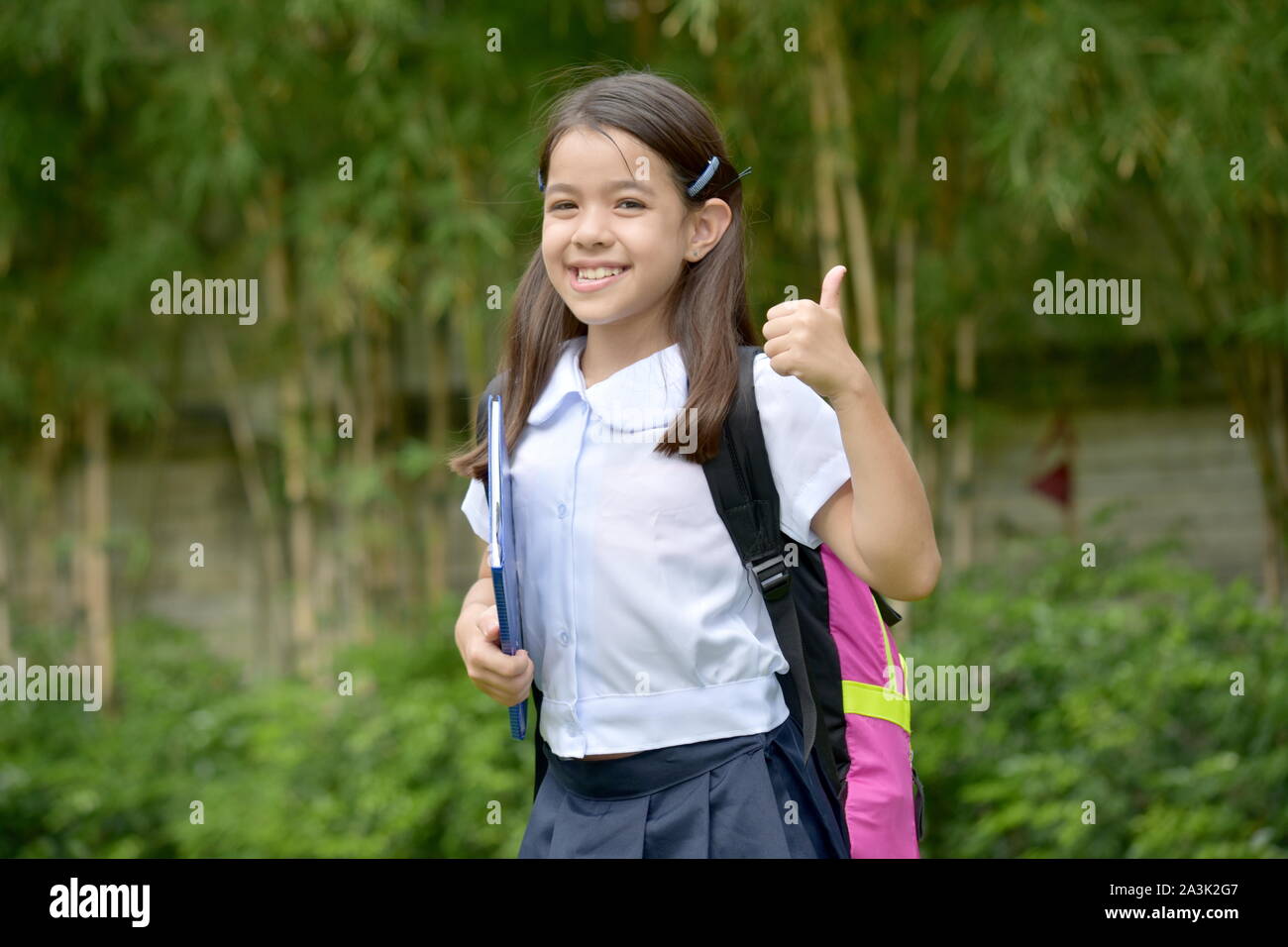 A Filipina School Girl And Happiness Stock Photo