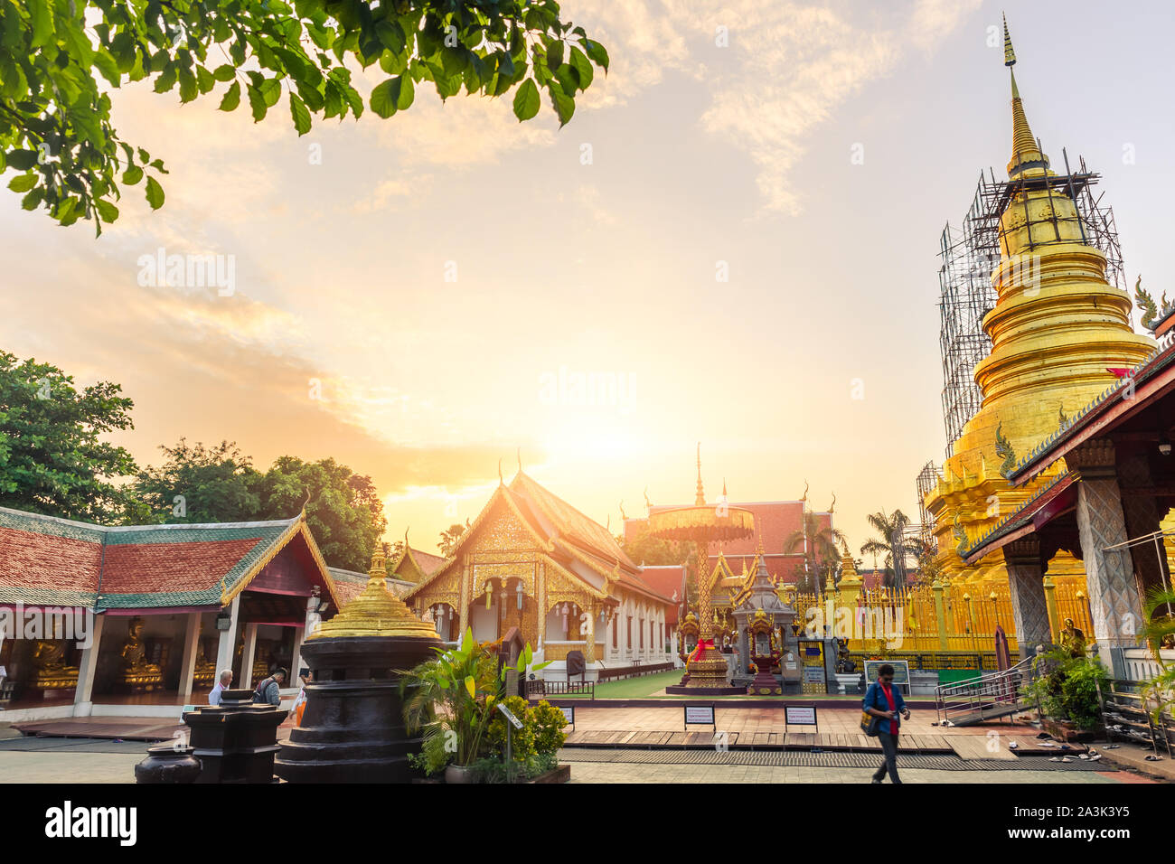 Beautiful sunset view of Wat Phra That Hariphunchai is a Buddhist temple travel place in Lamphun, Thailand. 22 August 2019. Stock Photo