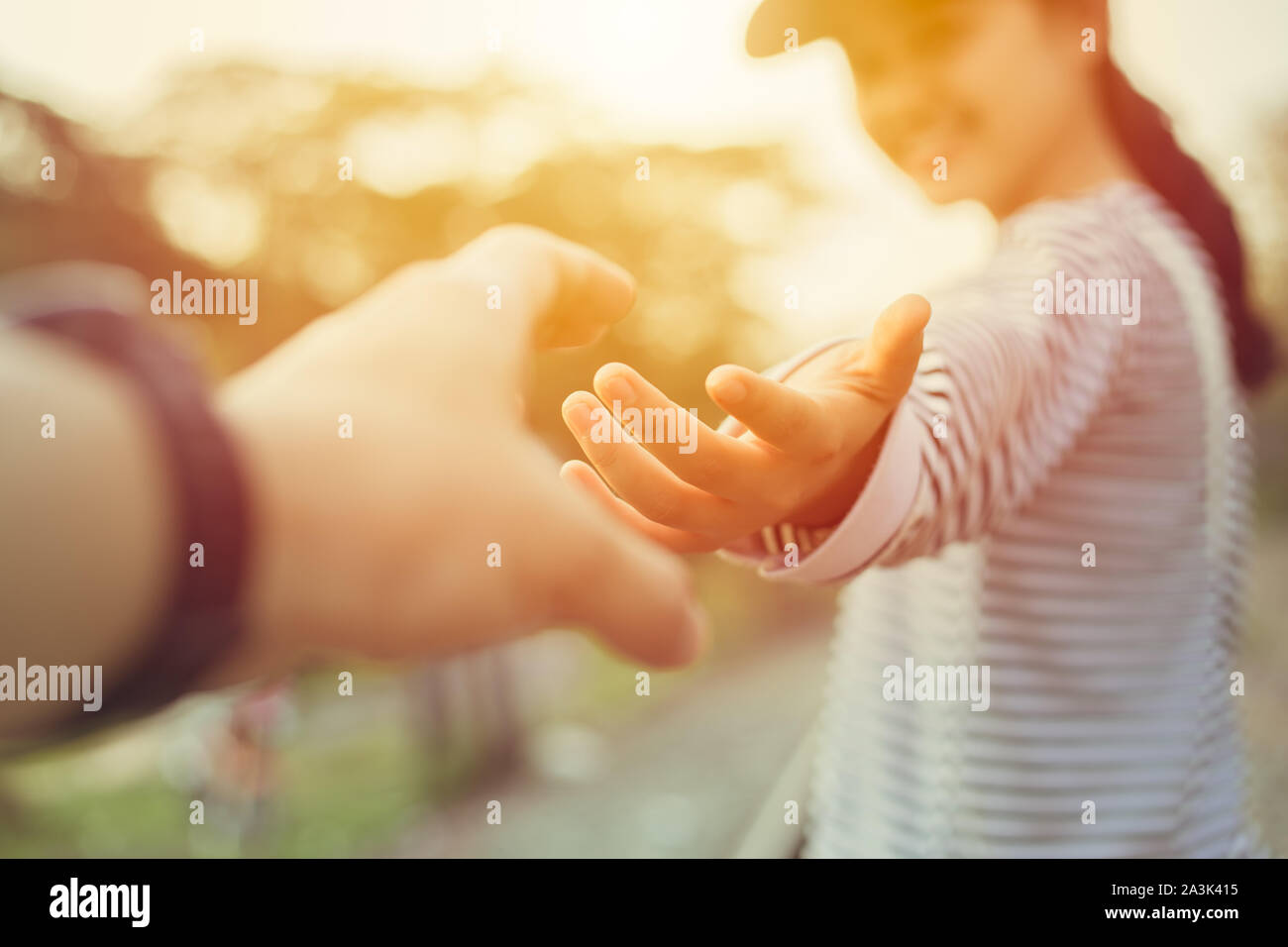 Girl teen smiling and reach her hand. Help Touch Care Support be a Good Friend with Love concept. Stock Photo
