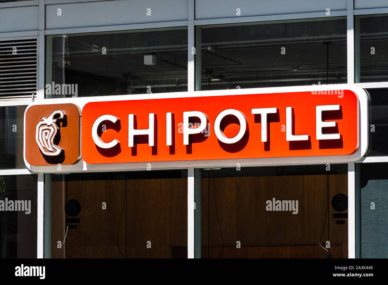 Sep 21, 2019 San Francisco / CA / USA - Close up of Chipotle sign at one of their restaurant location in SOMA district; Chipotle Mexican Grill, Inc is Stock Photo