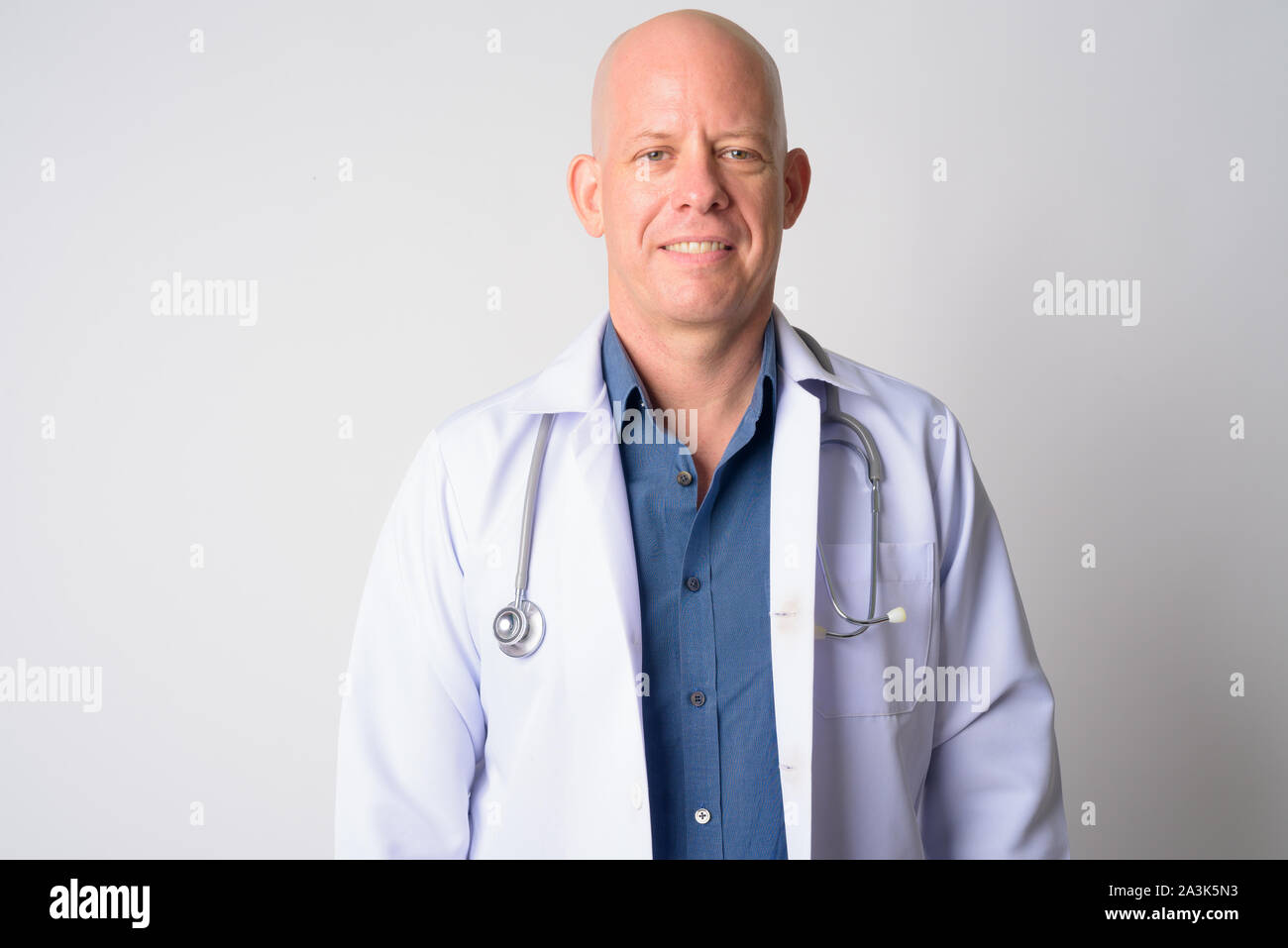 Happy mature bald man doctor hi-res stock photography and images - Alamy