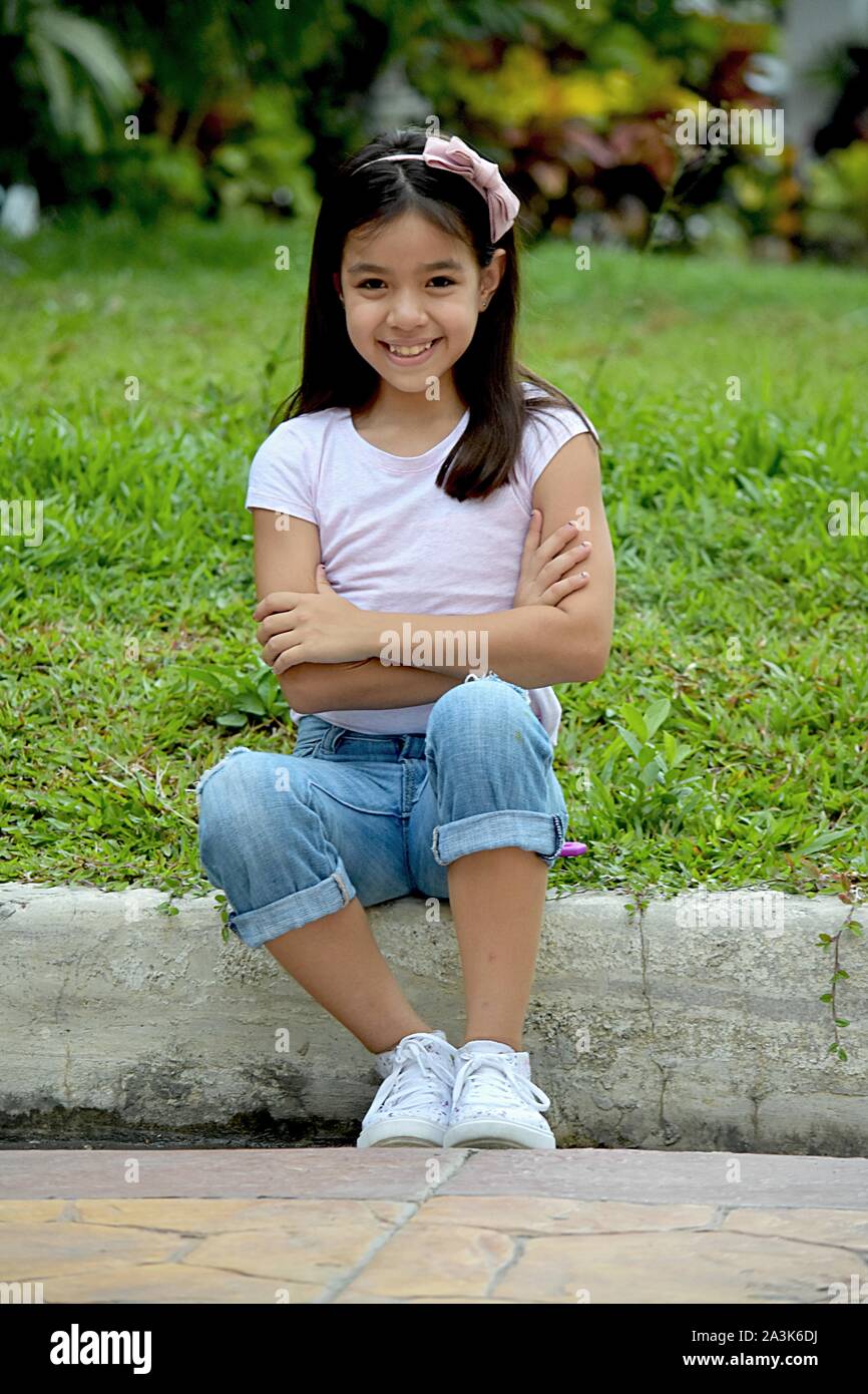 A Petite Asian Girl And Confidence Stock Photo