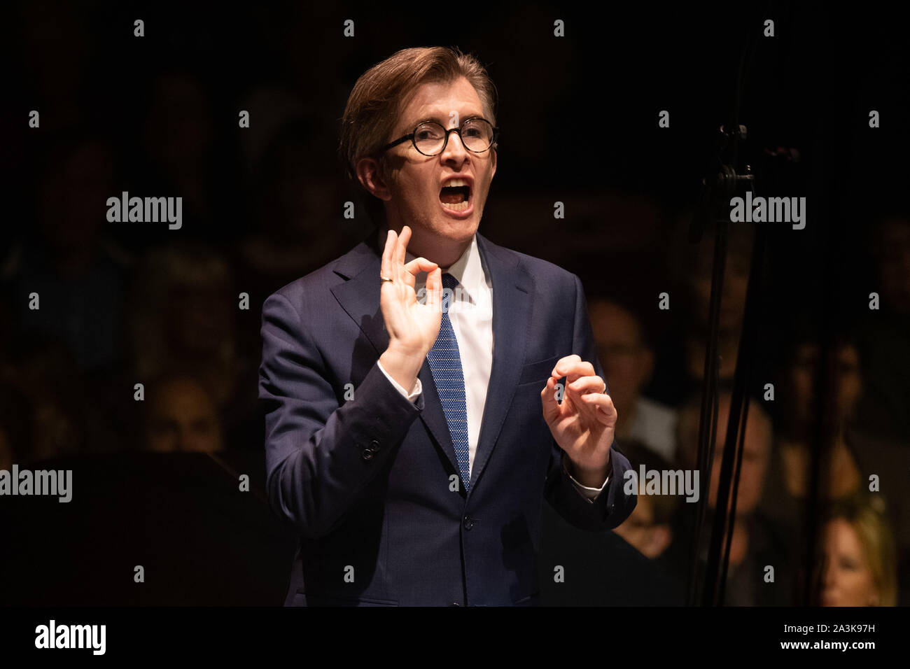 Gareth Malone conducts the Bournemouth Symphony Orchestra at Classic FM Live at London's Royal Albert Hall. Stock Photo