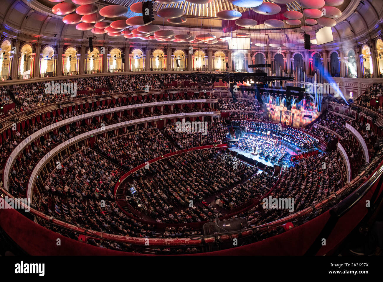 Pyrotechnics during the grand finale of the final performance lead by Stephen Barlow conducting the Bournemouth Sympathy Orchestra and Chorus during a performance of 1812 Overture by Tchaikovsky at Classic FM Live at London's Royal Albert Hall. Stock Photo