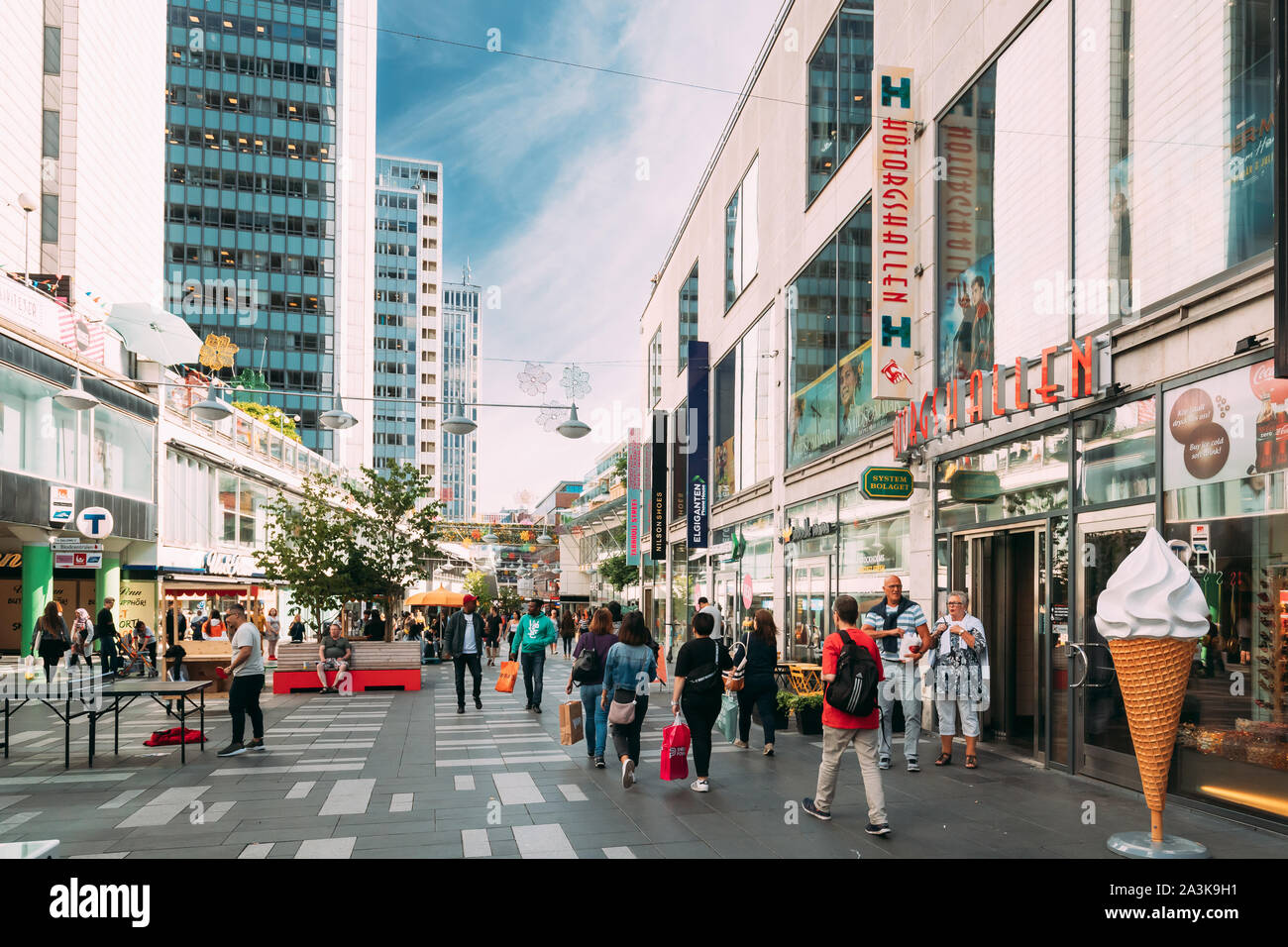 Stockholm, Sweden  - June 28, 2019: Tourists People Walking In Famous Drottninggata Street. Drottninggatan (Queen Street) In Stockholm, Sweden, Is A M Stock Photo