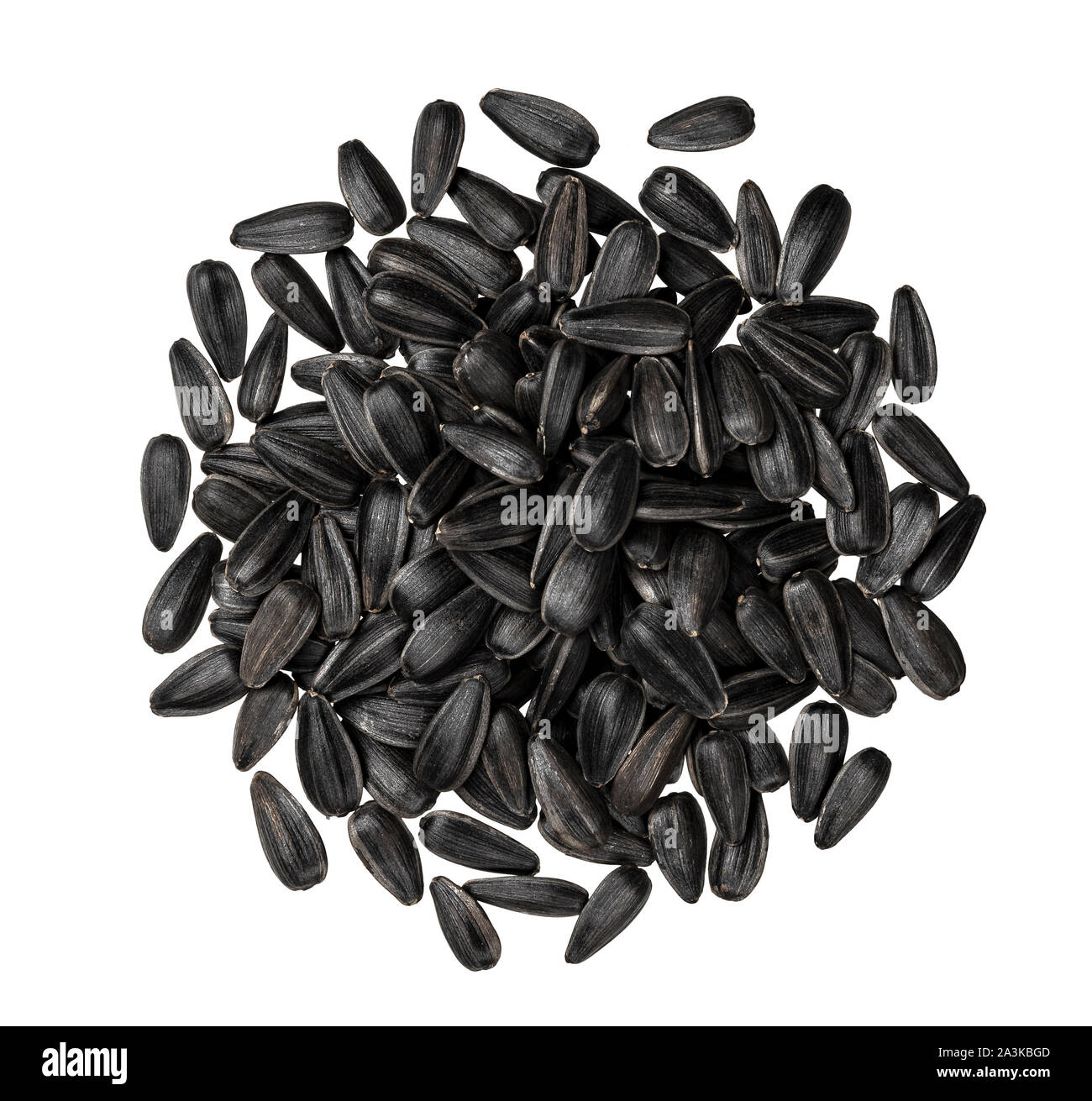 Pile of black sunflower seeds isolated on white background with ...