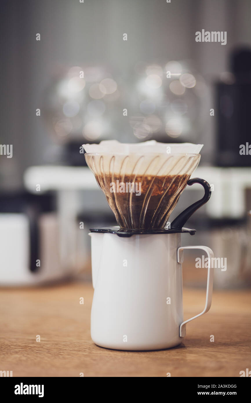 https://c8.alamy.com/comp/2A3KDGG/alternative-coffee-funnel-with-filter-and-coffee-over-the-pitcher-2A3KDGG.jpg