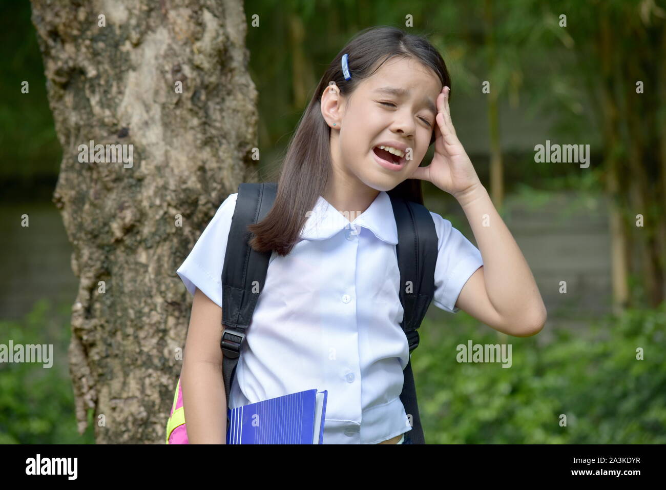 Crying Female Student School Girl Wearing Uniform Stock Photo