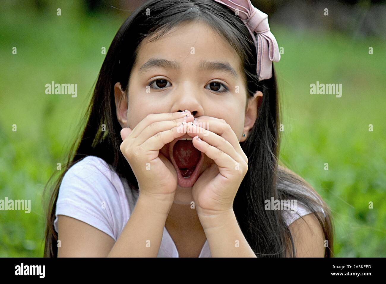 Youthful Girl Yelling Stock Photo