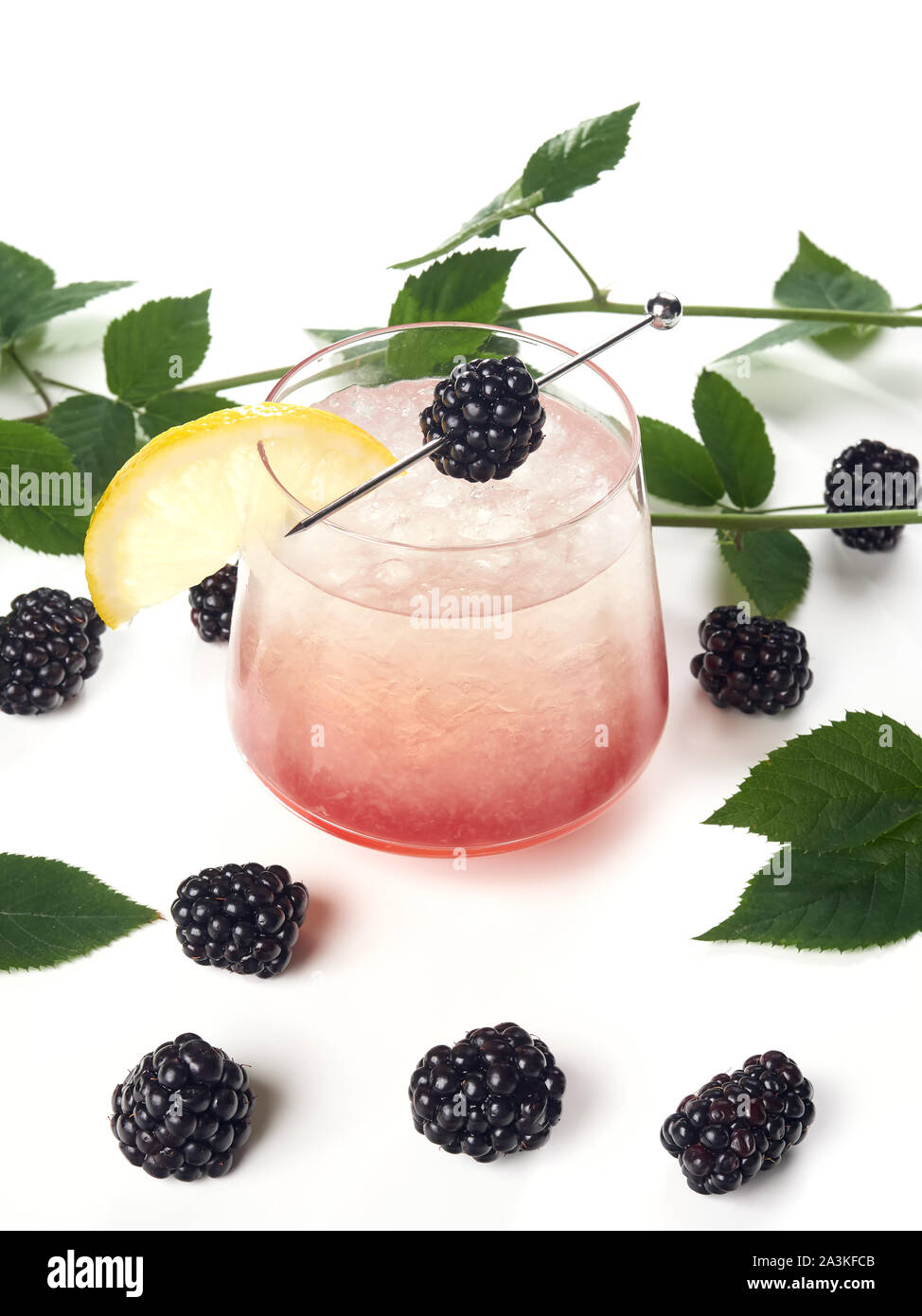 Bramble cocktail. A gin sour cocktail spiked with an eyecatching shot of blackberry liqueur