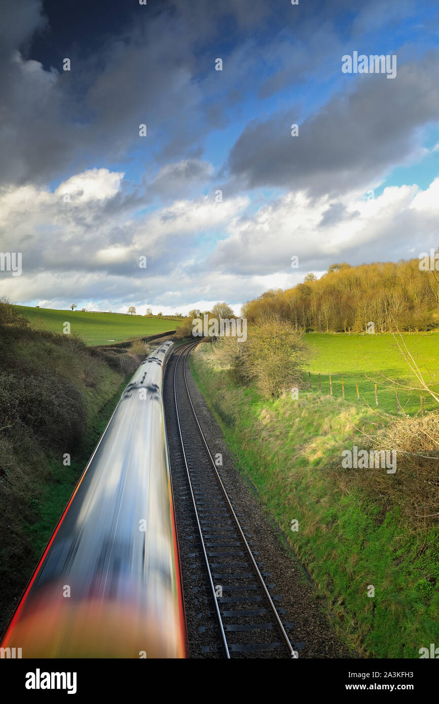 the Exeter to London Waterloo train passing near Milborne Port, Somerset, England, UK Stock Photo