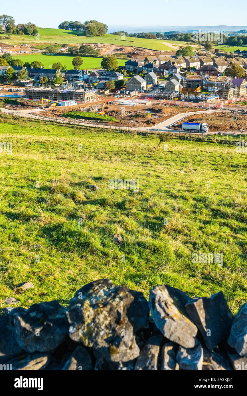 New housing development being built on a green field site on the outskirts of Buxton, Derbyshire,UK Stock Photo