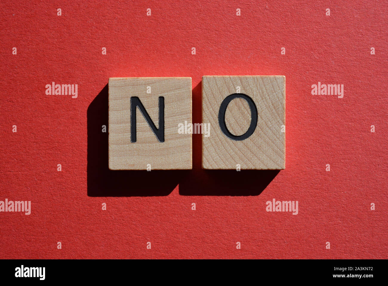 No in 3d wooden alphabet letters isolated on a red background Stock Photo