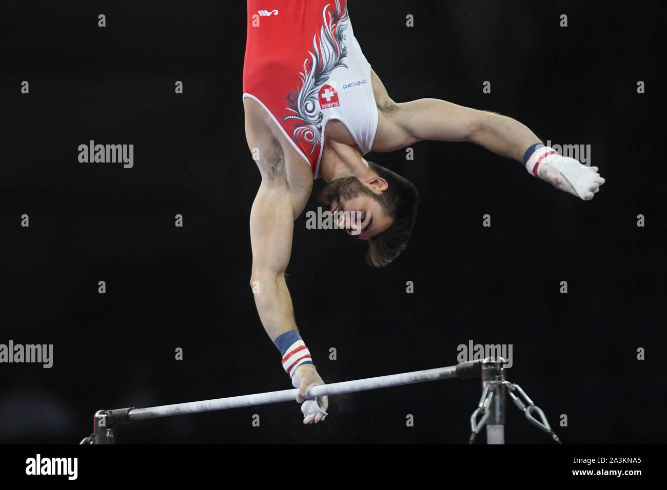 Stuttgart, Germany. 7th Oct, 2019. OLIVER HEGI from Switzerland competes on the high bar during the qualification round of competition held in the Hanns-Martin-Schleyer-Halle in Stuttgart, Germany. Credit: Amy Sanderson/ZUMA Wire/Alamy Live News Stock Photo