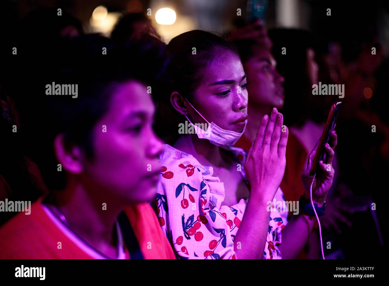 Hindu devotees take part in Navratri celebrations by the Sri Mariamman Temple on October 8, 2019 in Bangkok, Thailand. The widely observed Hindu festival of Navratri celebrates the victory of one of a number of gods, depending on the region, over evil and takes place over nine holy nights. Stock Photo