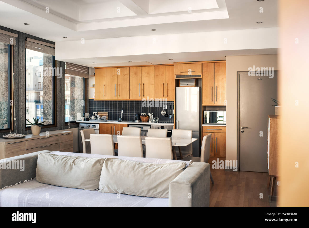 Interior of the lounge and kitchen area of an apartment Stock Photo