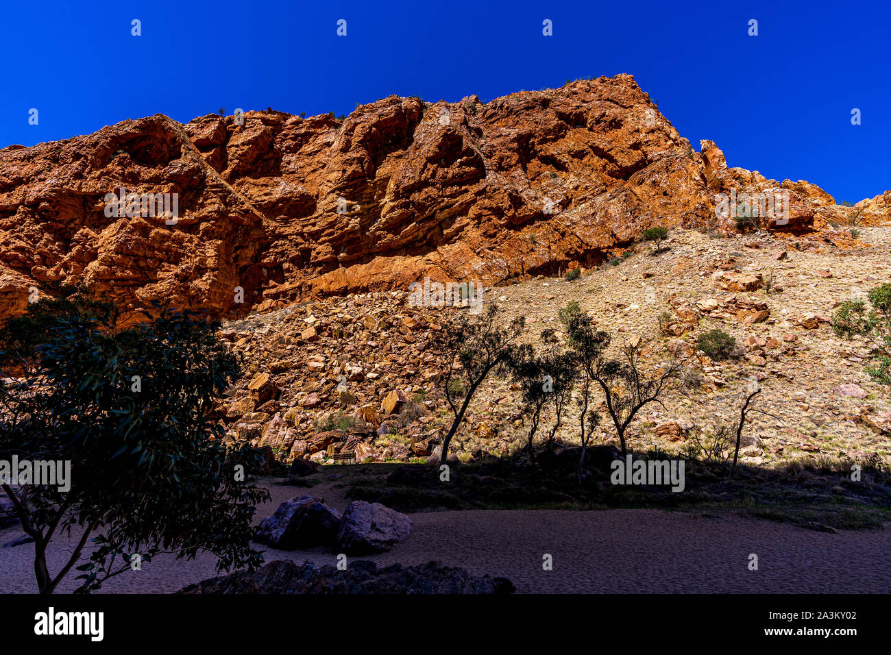 The walking track and dry riverbed that leads to Simpsons Gap in the Northern Territory, Australia. Stock Photo