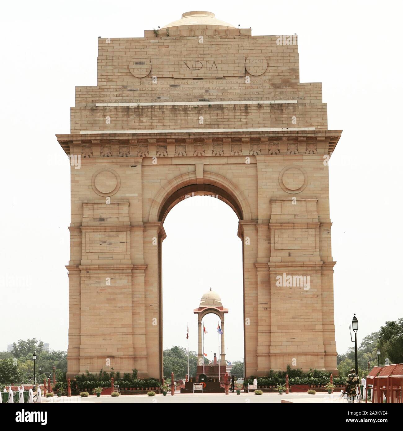 The India Gate is a war memorial located astride the Rajpath, on the eastern edge of the ' ceremonial axis' of New Delhi, formerly called Kingsway. Stock Photo