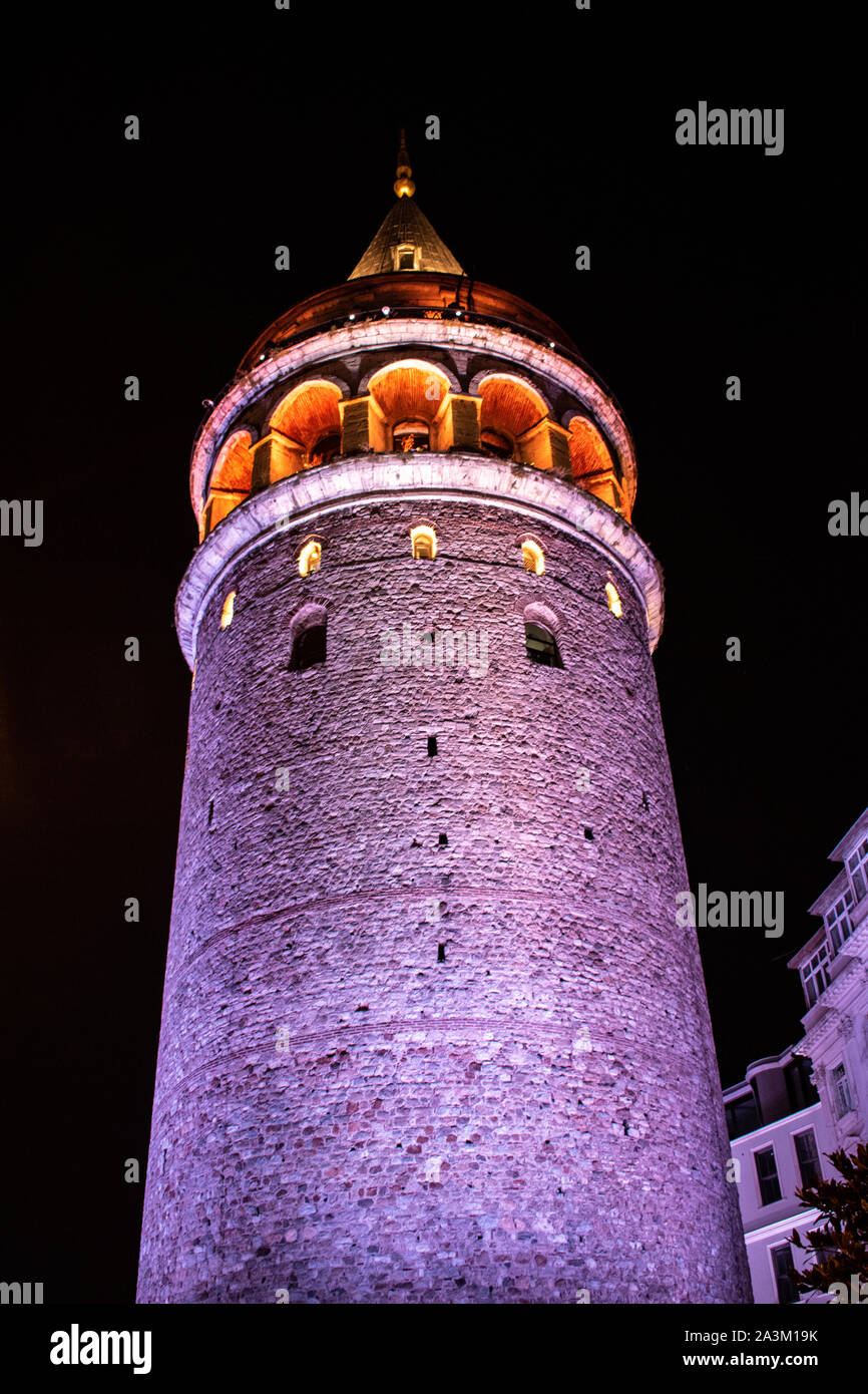 Istanbul, Turkey: night view of Galata Tower (Galata Kulesi or Christea Turris), medieval stone tower built by Genoese in 1348 in the Karakoy quarter Stock Photo