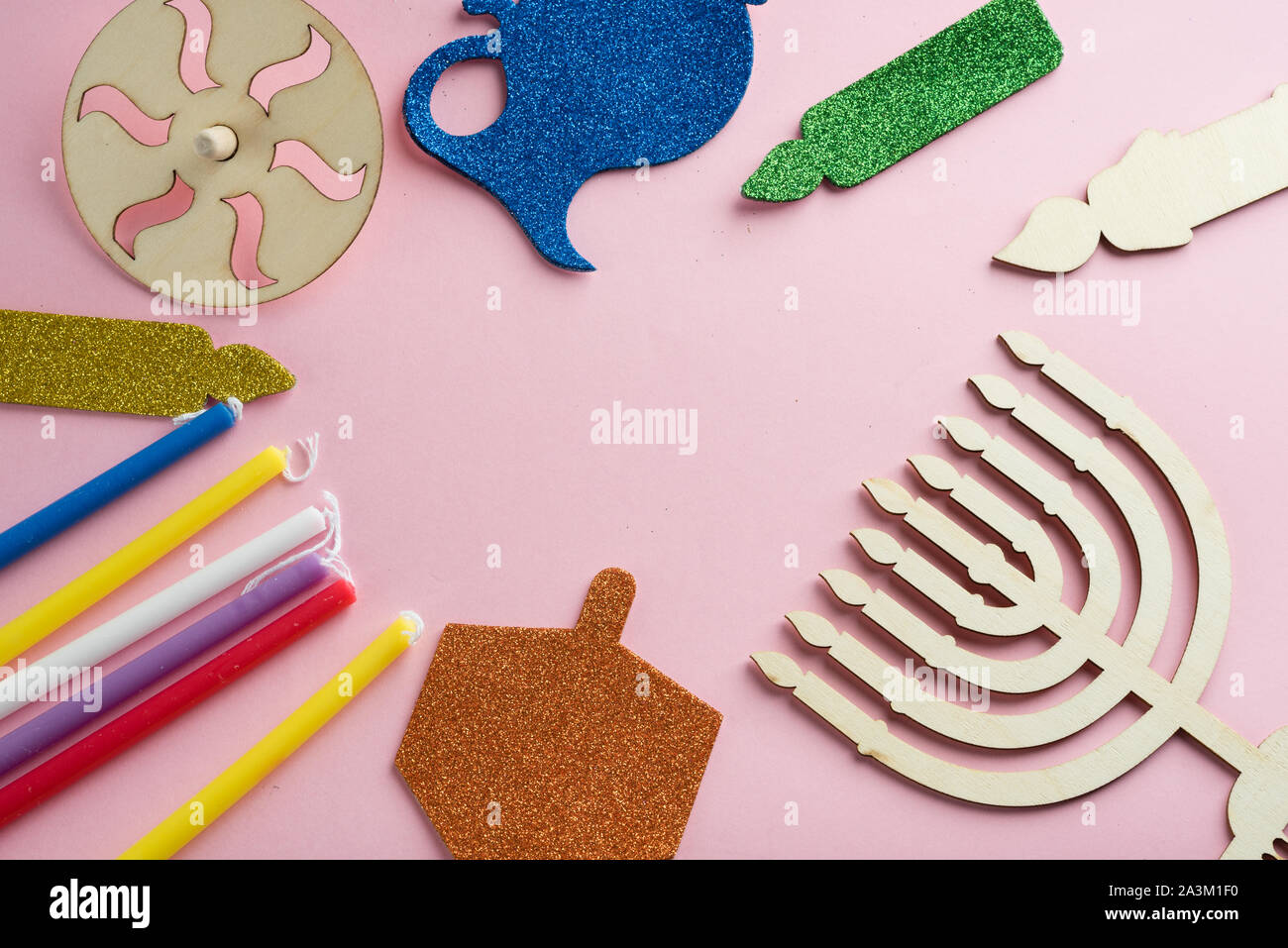 Image of jewish holiday Hanukkah with wooden dreidels spinning top