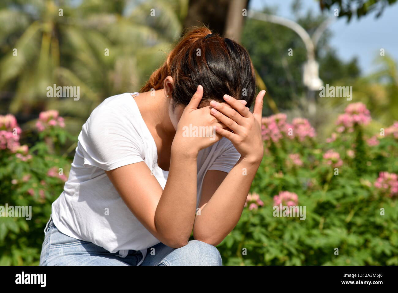 Female And Sadness Stock Photo