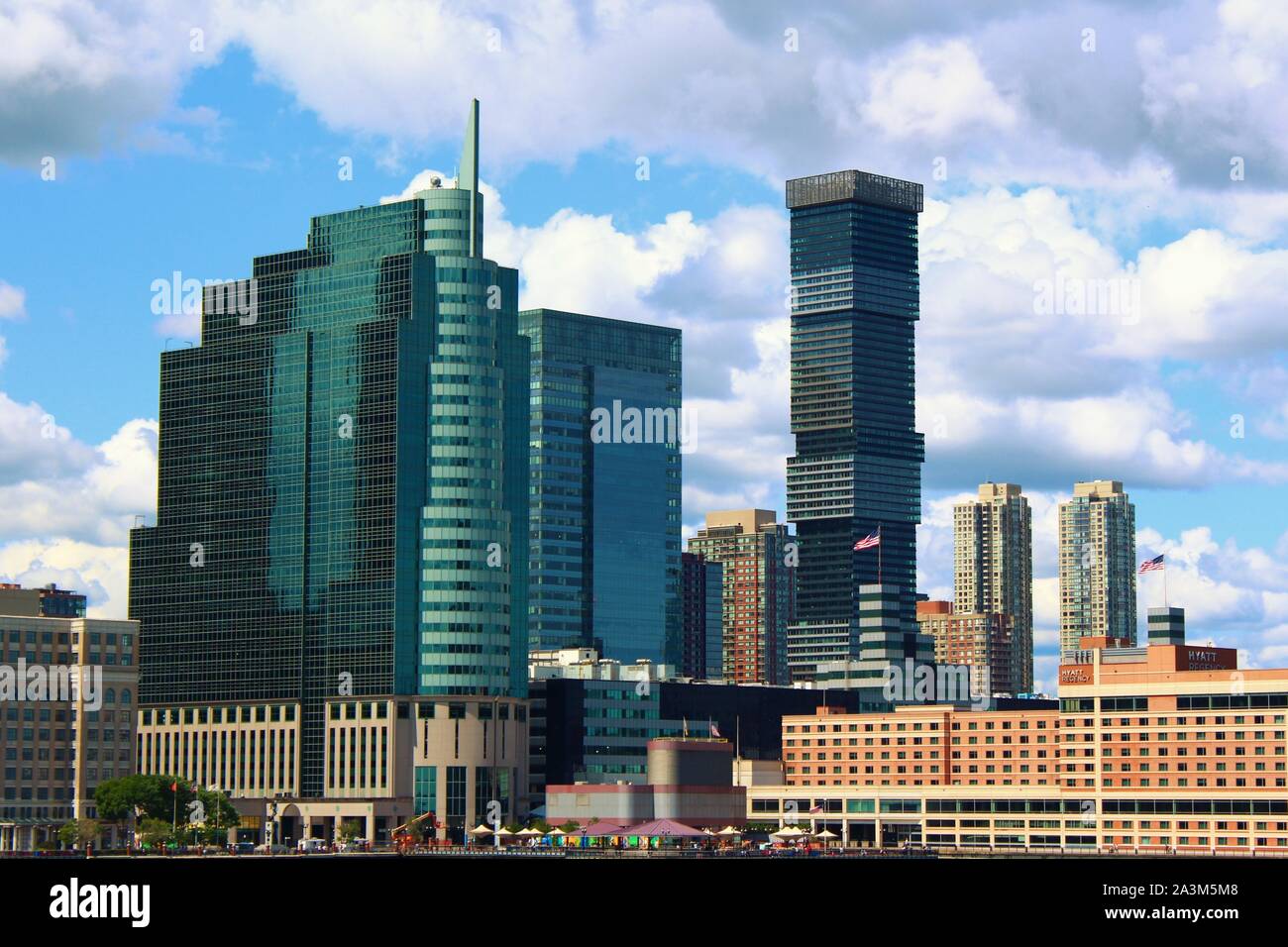 View from the Hudson River of some of the buildings that make up the skyline of Jersey City, which is opposite the skyline of Lower Manhattan, NYC. Stock Photo