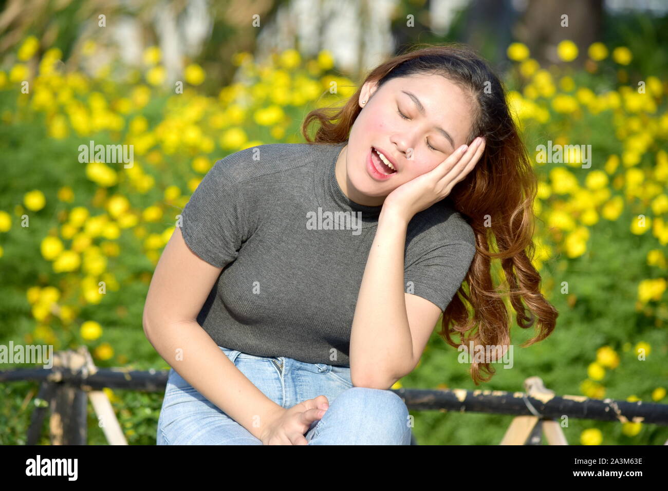 Sleepy Pretty Asian Female Stock Photo
