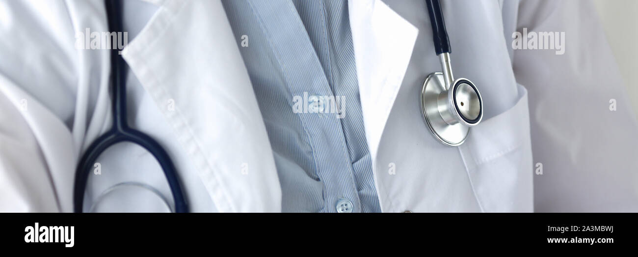 Female doctor with stethoscope in white uniform against Stock Photo - Alamy