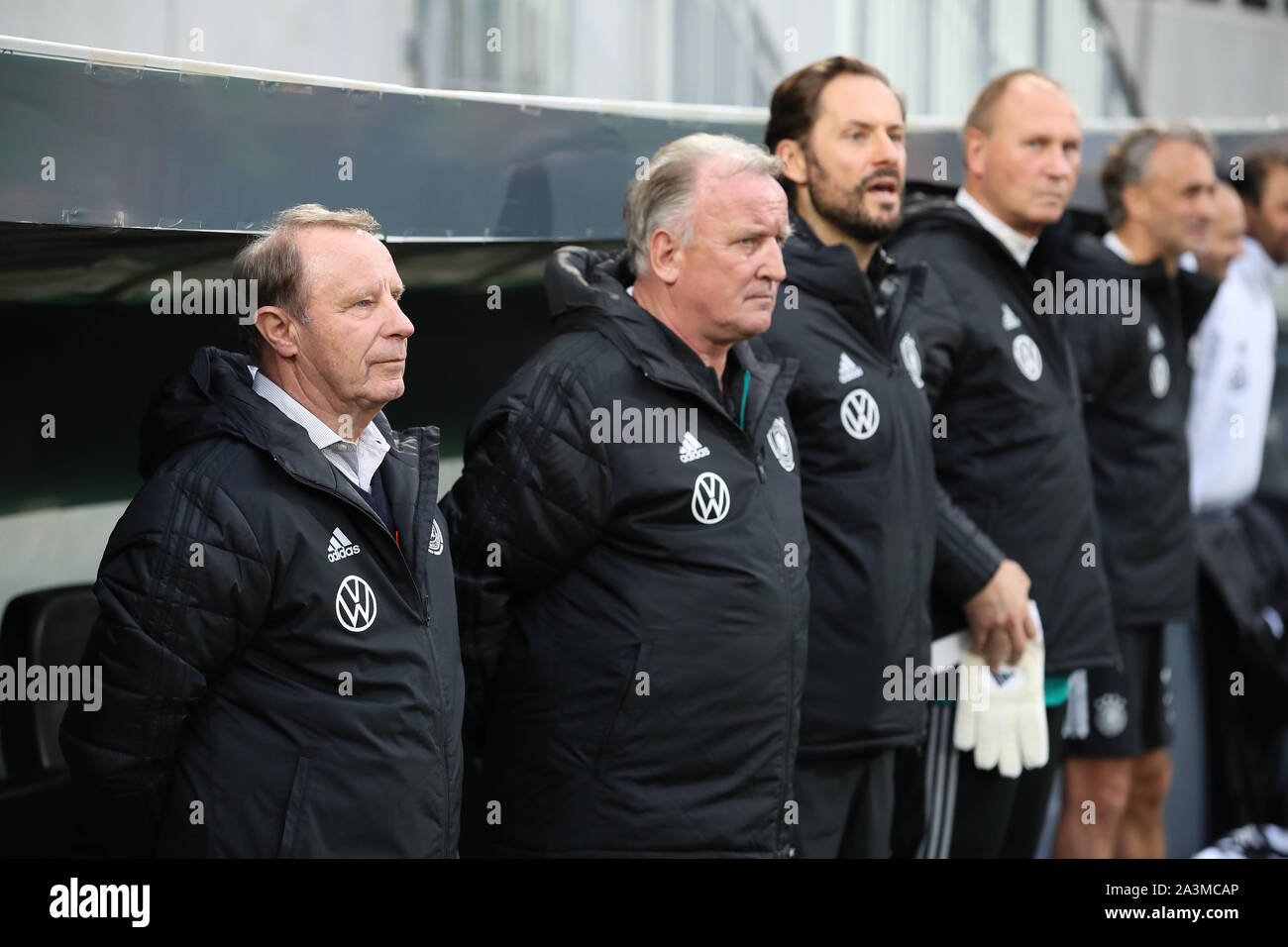 07 October 2019, Bavaria, Fürth: Soccer: DFB-All-Stars against Italy in the Sportpark Ronhof Thomas Sommer. The German Berti Vogts (from left), Andreas Brehme, are on the court before the game starts. Photo: Daniel Karmann/dpa Stock Photo