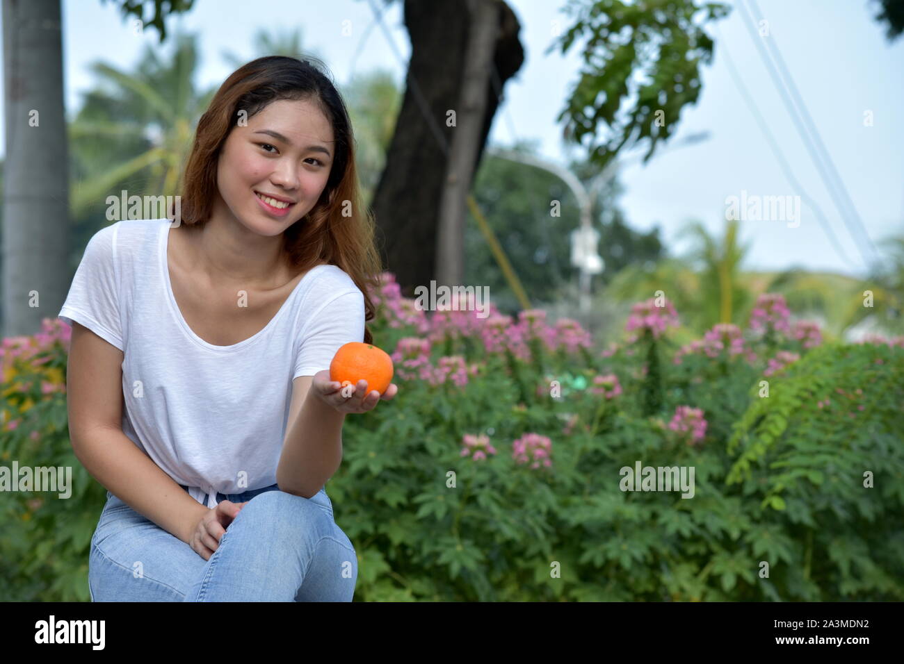 Female And Happiness With Fruit Stock Photo