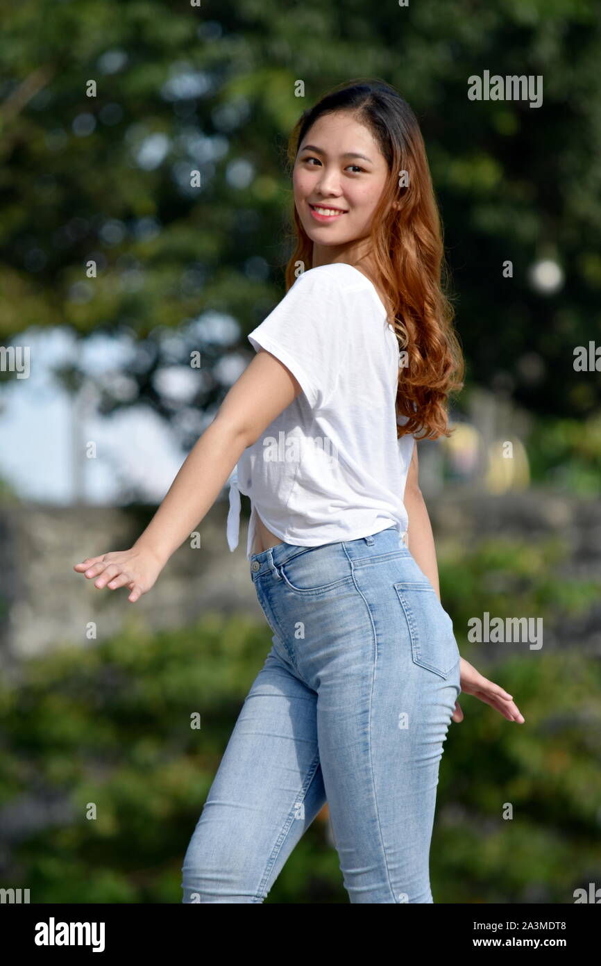 Asian young woman dancing hi-res stock photography and images - Alamy