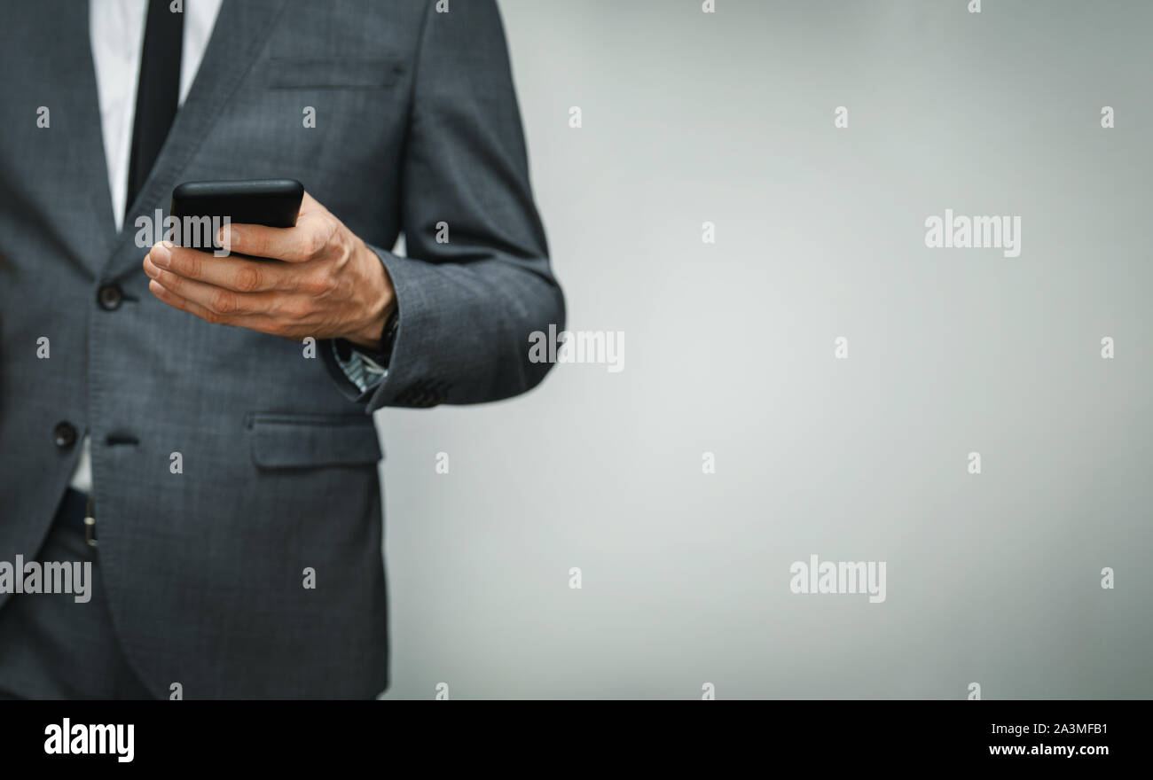 Businessman wearing gray suit hi-res stock photography and images - Alamy