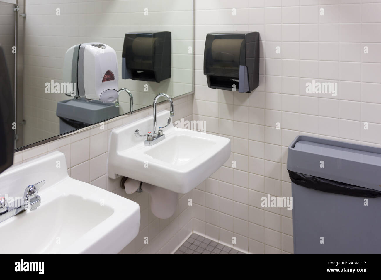 Clean white sink in typical american public restroom Stock Photo Alamy