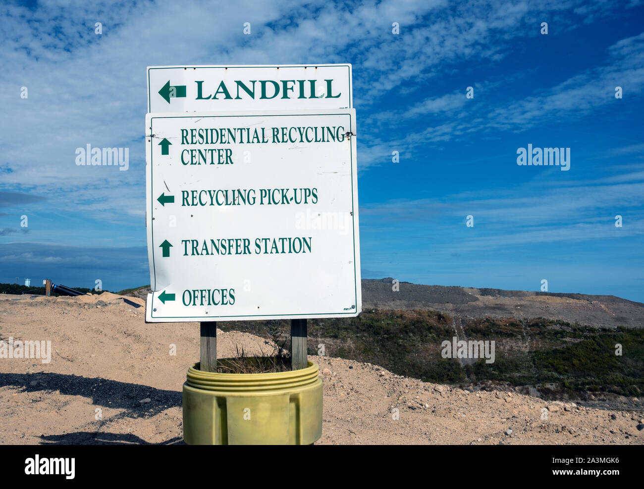 Signs with arrows for Landfill, Residential Recycling Center, Recycling