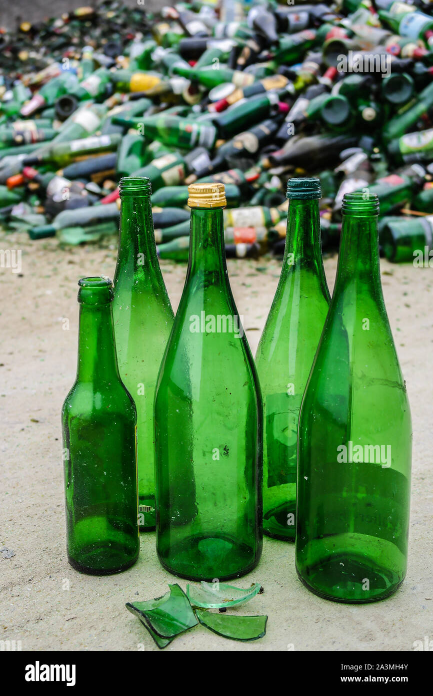 Green glass bottles recycling yard Stock Photo Alamy