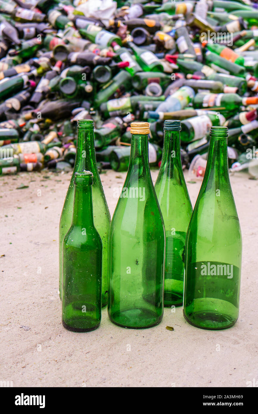 Green glass bottles recycling yard Stock Photo Alamy