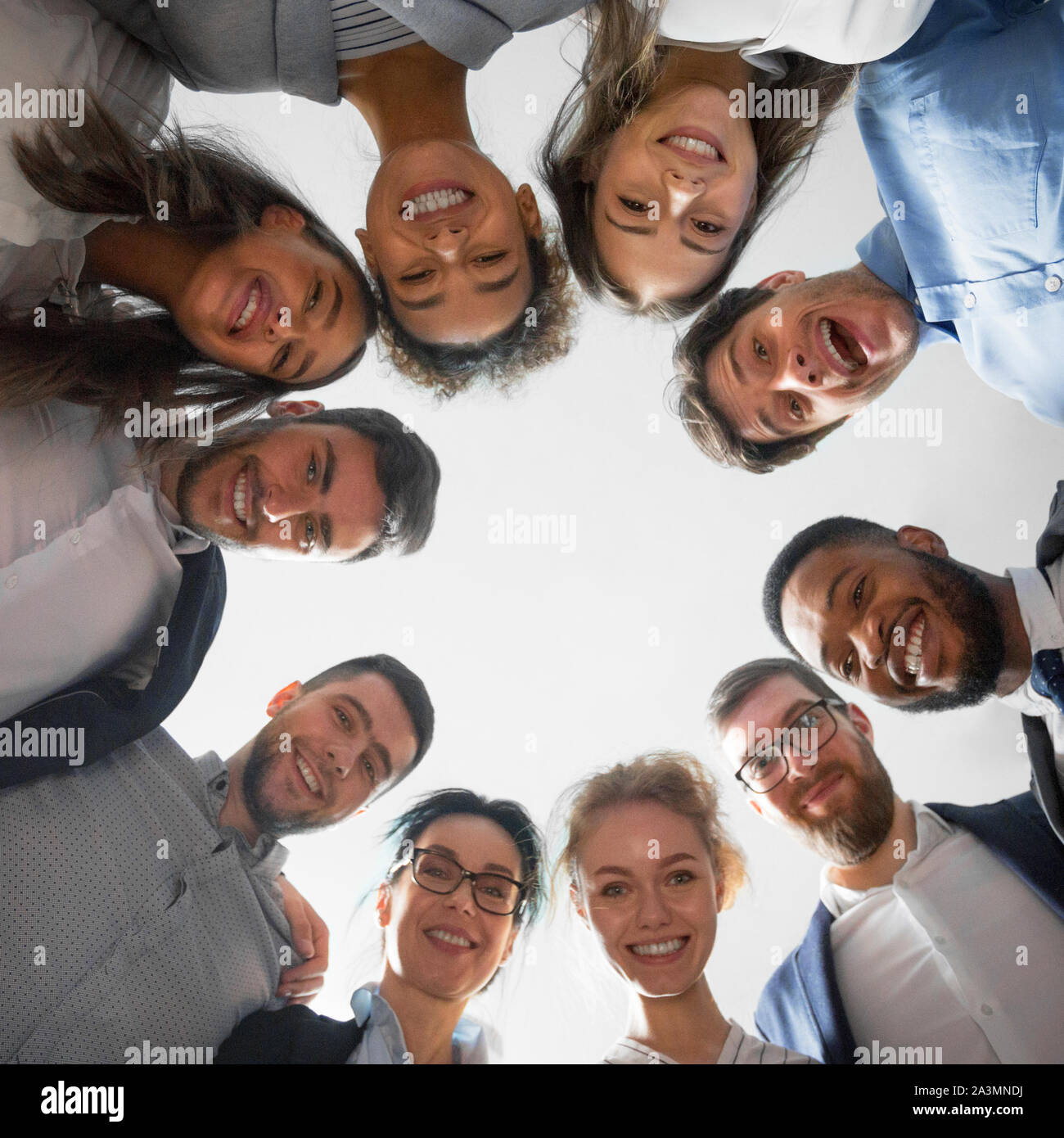 Happy diverse business people standing in circle Stock Photo Alamy