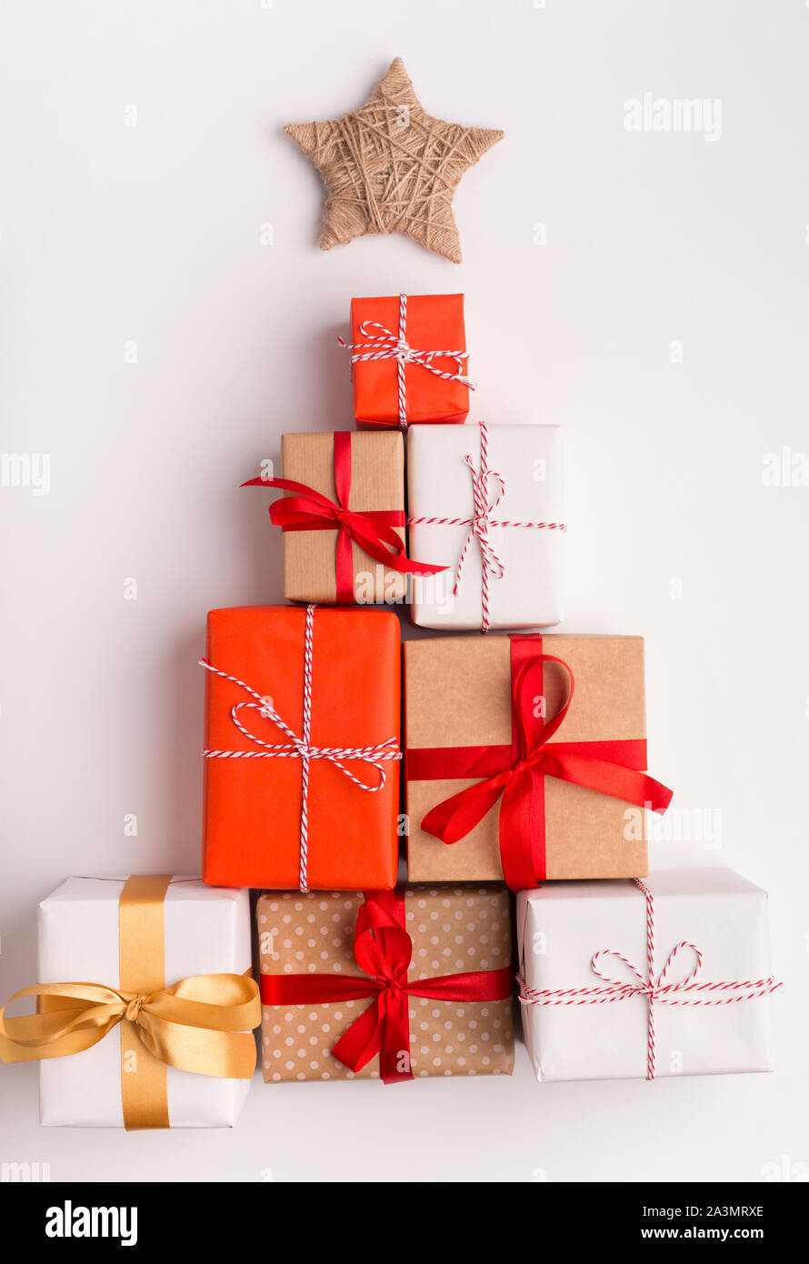 Alternative Christmas tree made of colored present boxes Stock Photo