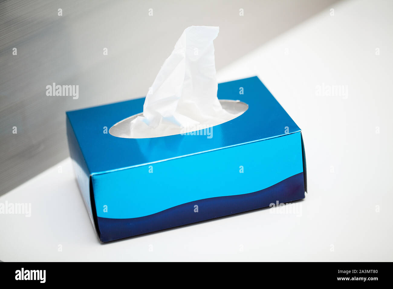 Box white hygiene napkins in light bathroom Stock Photo - Alamy