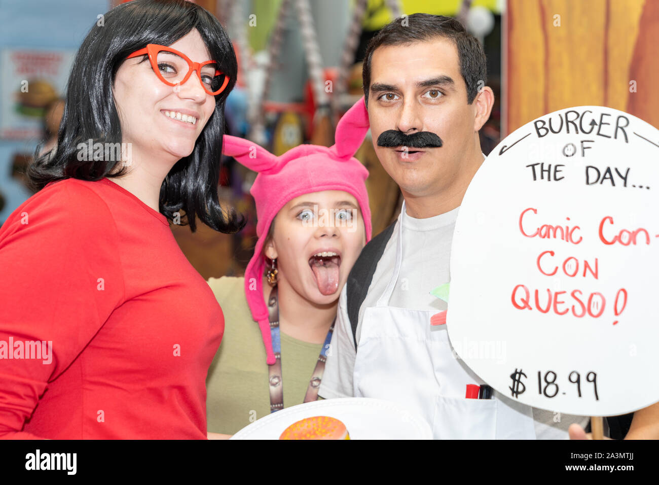 New York, New York - October 6, 2019: Family of cosplayers dressed as Bob's Burger characters during New York Comic. Stock Photo