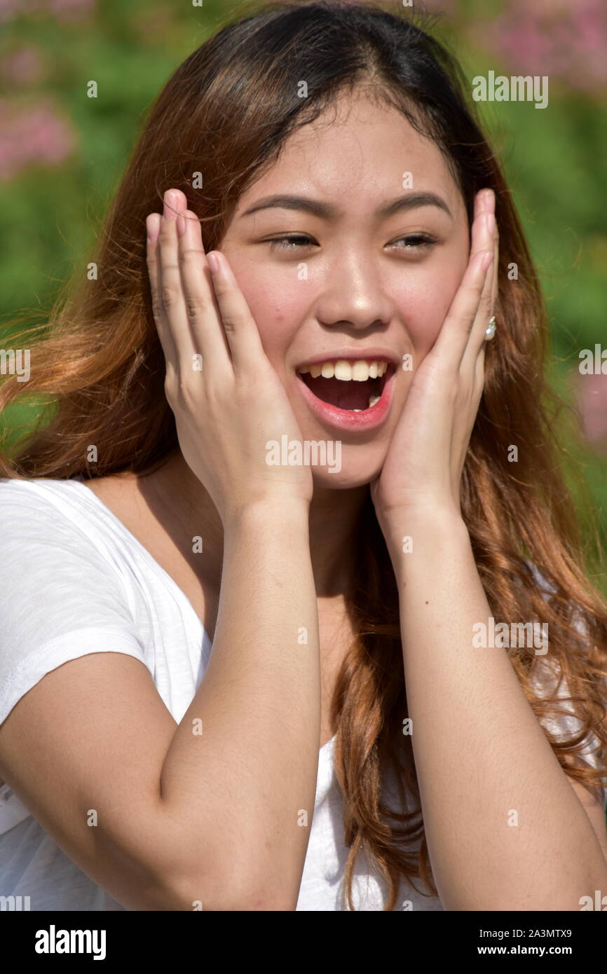 Surprised Attractive Asian Adult Female Stock Photo
