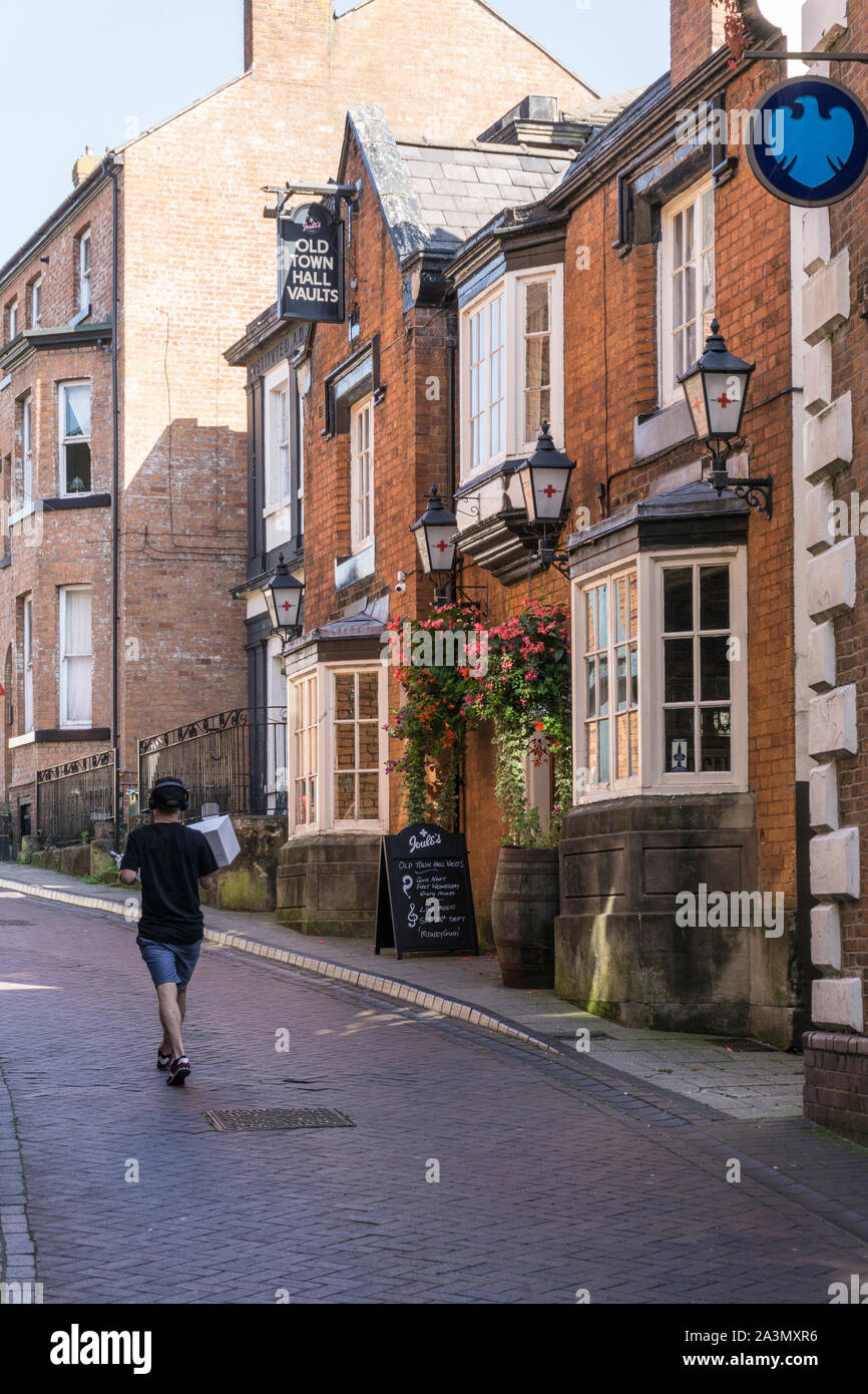 Old Town Hall Vaults, a 19th century red brick house, now housing a Joules pub; Whitchurch, Shropshire, UK Stock Photo