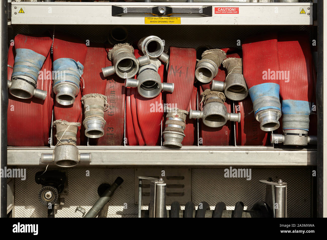 Fire Hoses at the back of a Fire Engine Stock Photo