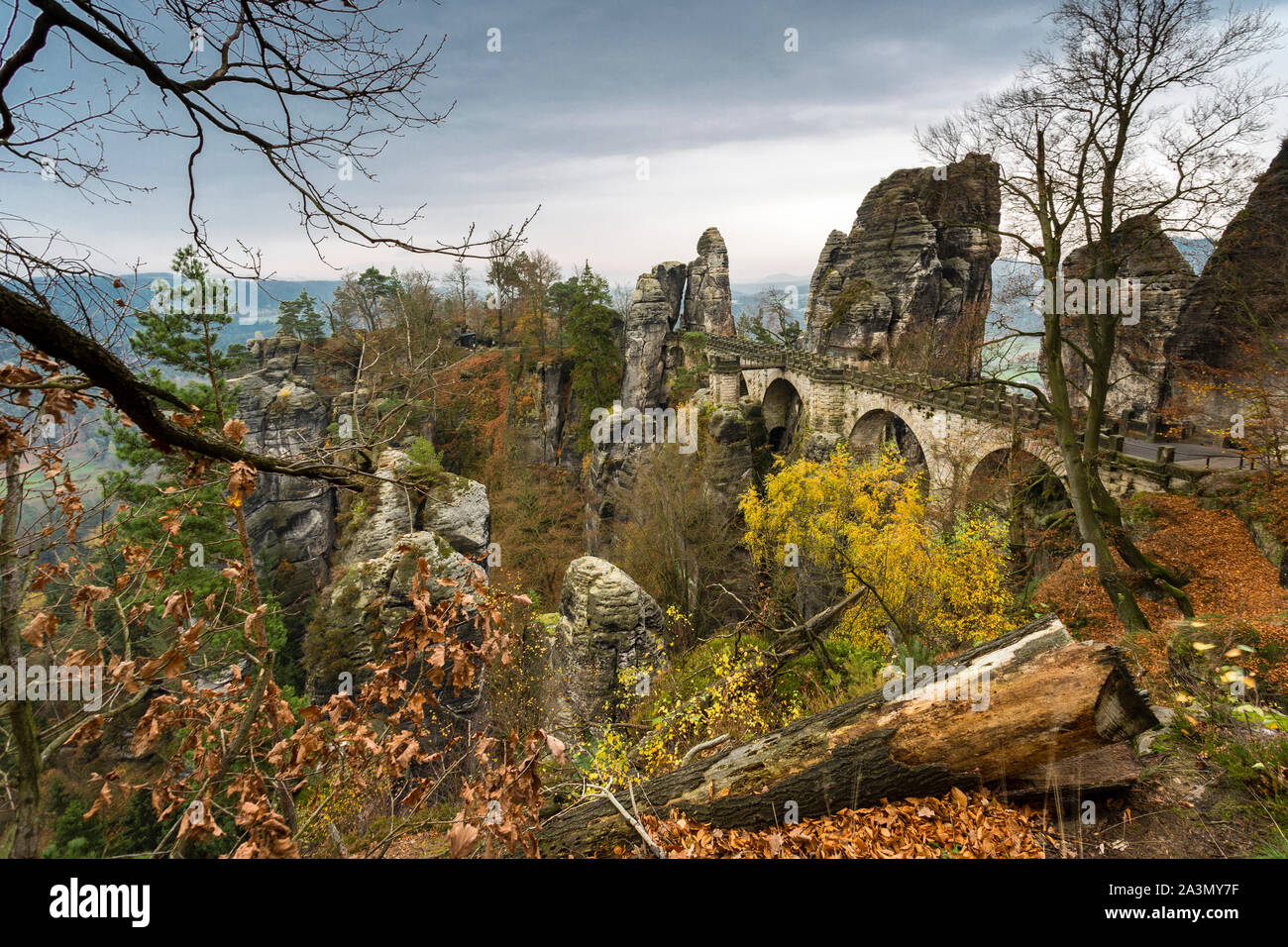 Bastei bridge Elbsandstein mountains, Autuum with coloured trees, Lilienstein Plateau in the Background, Germany Stock Photo