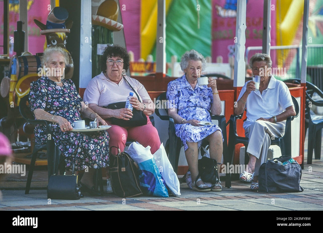 Mature women having a tea break, Worthing, West Sussex, England, UK. Circa 1990's Stock Photo