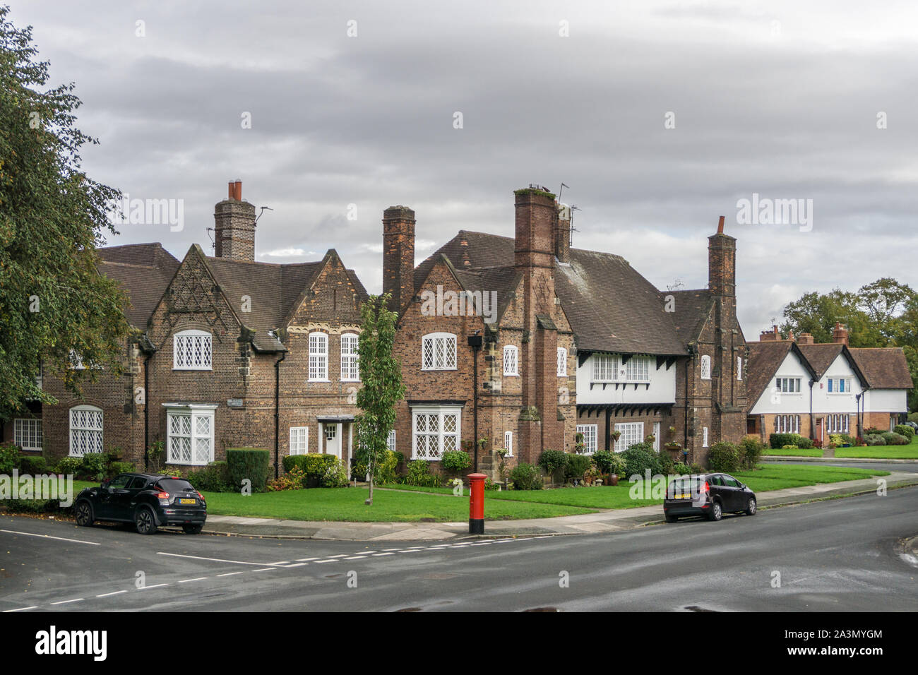 Houses in the model village of Port Sunlight, Wirral, Merseyside, UK; originally built by Lever Bros for their factory workers. Stock Photo