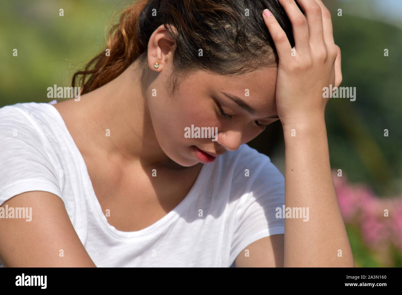 Beautiful Female And Sadness Stock Photo