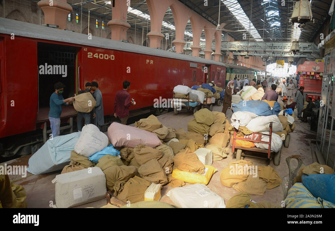 Pakistani Post Office Worker Sorts Mails After It Was Unloaded