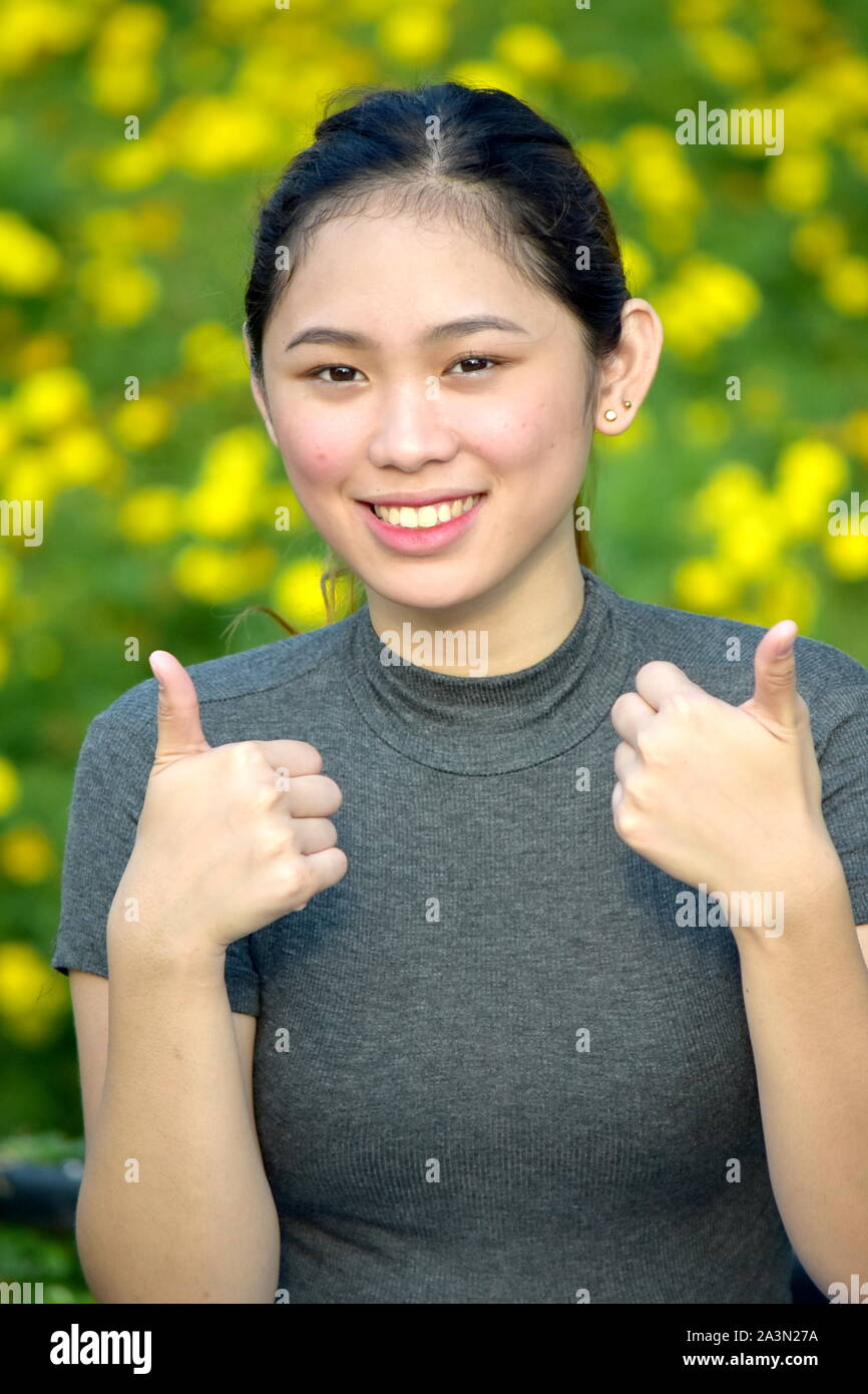 Woman With Thumbs Up Stock Photo