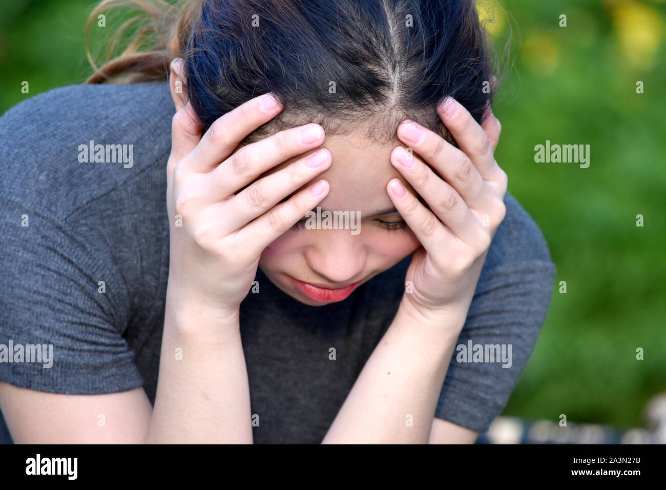 Worried Young Minority Female Woman Stock Photo